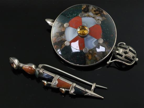 A Scottish silver and multi hardstone sword and shield brooch and a similar gem and hardstone set dirk brooch, largest 72mm.